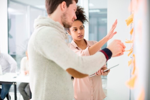 two people taking about their notes