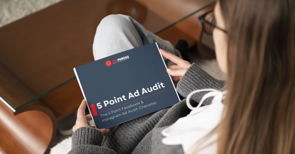 lady with ebook in hands titled '5 point ad audit'